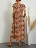 https://cdn.shopify.com/s/files/1/0894/1948/1459/files/A-Line_Summer_Dress_for_Women__Elegant_Floral_Design_1.jpg?v=1760530290