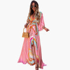 https://cdn.shopify.com/s/files/1/0980/8547/0533/files/ColorfulSummerDress-Women_sMaxiDresswithFloralPrint34.jpg?v=1777384743