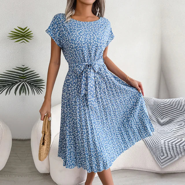 https://cdn.shopify.com/s/files/1/0811/5545/7372/files/Dames-Lente-Zomer-Korte-Mouw-Hoge-Taille-Chique-Jurk-Mode-Bloemen-Geplooid-Een-Lijn-Lange-Jurk.jpg_640x640.jpg__1.webp?v=1746181162