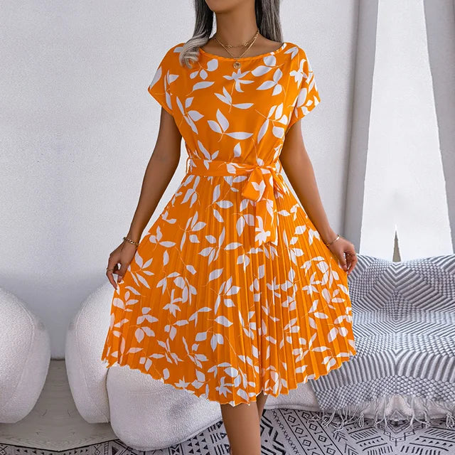 https://cdn.shopify.com/s/files/1/0811/5545/7372/files/Dames-Lente-Zomer-Korte-Mouw-Hoge-Taille-Chique-Jurk-Mode-Bloemen-Geplooid-Een-Lijn-Lange-Jurk.jpg_640x640.jpg__3.webp?v=1746181162