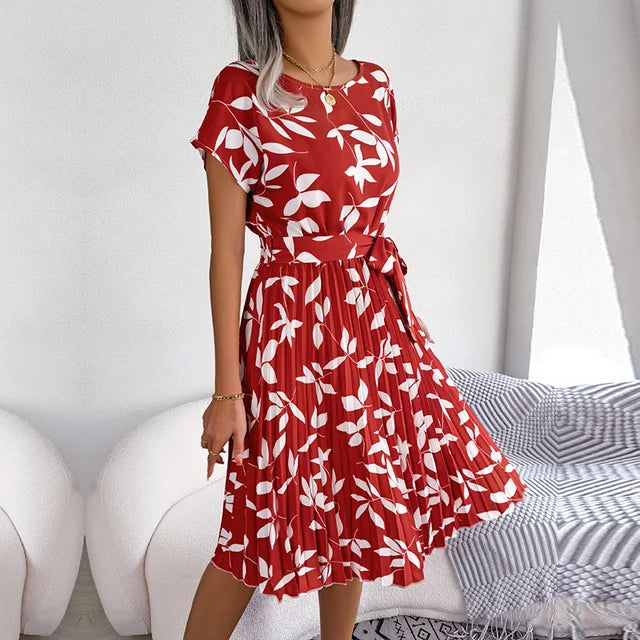 https://cdn.shopify.com/s/files/1/0811/5545/7372/files/Dames-Lente-Zomer-Korte-Mouw-Hoge-Taille-Chique-Jurk-Mode-Bloemen-Geplooid-Een-Lijn-Lange-Jurk.jpg_640x640.jpg__4.webp?v=1746181162