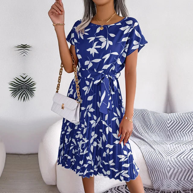 https://cdn.shopify.com/s/files/1/0811/5545/7372/files/Dames-Lente-Zomer-Korte-Mouw-Hoge-Taille-Chique-Jurk-Mode-Bloemen-Geplooid-Een-Lijn-Lange-Jurk.jpg_640x640.jpg__5.webp?v=1746181162