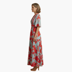 https://cdn.shopify.com/s/files/1/0980/8547/0533/files/FloralDresswithV-NeckforWomen_Elegant_Long_2_194da913-385c-4782-b455-342bbe2d63ff.png?v=1775666489