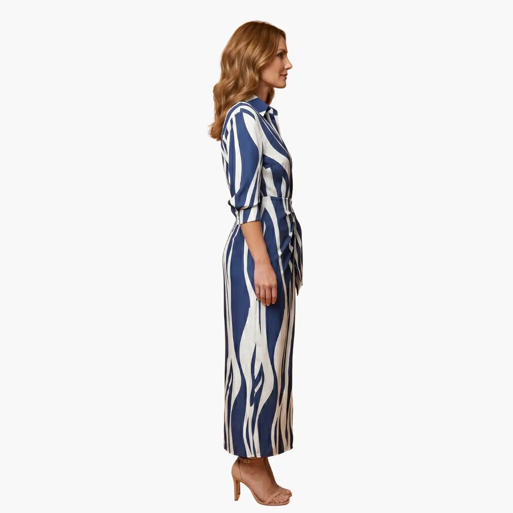 https://cdn.shopify.com/s/files/1/0980/8547/0533/files/Striped_Shirt_Dress_Women_s_Maxi_Dress_Made_of_Cotton_2.png?v=1777384978