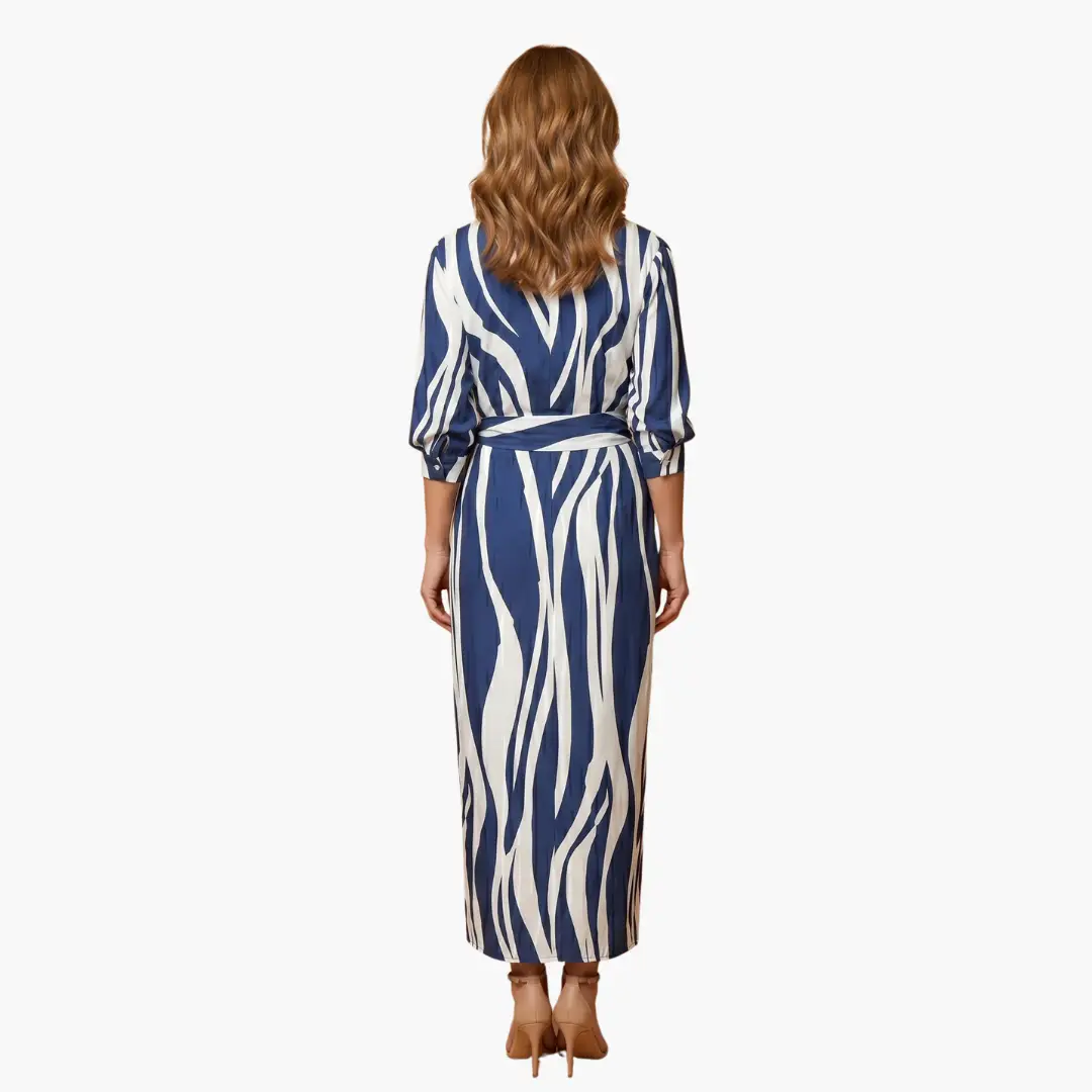 https://cdn.shopify.com/s/files/1/0980/8547/0533/files/Striped_Shirt_Dress_Women_s_Maxi_Dress_Made_of_Cotton_4.png?v=1777384979