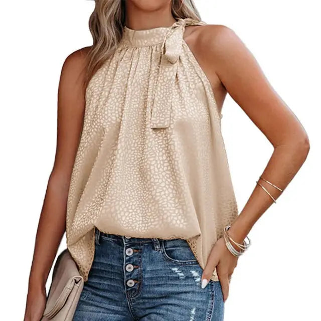 https://cdn.shopify.com/s/files/1/0822/8919/7383/files/Summer-Elegant-Women-Blouse-Leopard-Side-Bow-Summer-Temperament-Sleeveless-Loose-fitting-Ladies-Top-for-Office.jpg_640x640_0943f515-4b52-4e5e-8262-3e19b544414a.webp?v=1737537083