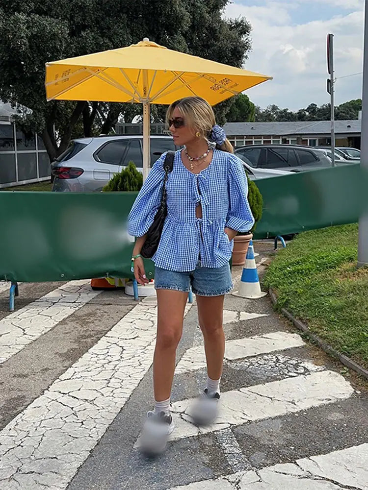 https://cdn.shopify.com/s/files/1/0822/8919/7383/files/Women-Fashion-Print-Lace-Up-Puff-Sleeve-T-Shirt-Elegant-Casual-Loose-Round-Neck-Tops-2024_a7788f57-1e55-40be-b512-68045d67f9a1.webp?v=1722343244