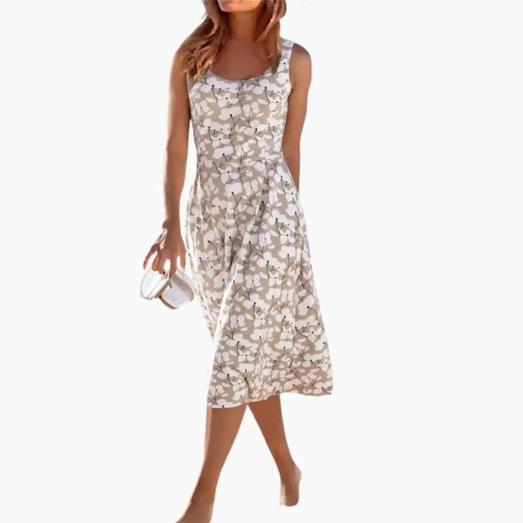 https://cdn.shopify.com/s/files/1/0980/8547/0533/files/Women_sRoundNeckFloralDress_1.jpg?v=1777384440