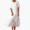 https://cdn.shopify.com/s/files/1/0980/8547/0533/files/Women_sSleevelessMidiDresswithRoundNecklineandPlainFinish_1.jpg?v=1777385293