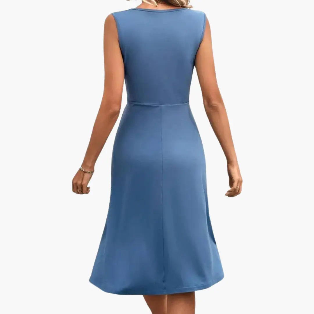 https://cdn.shopify.com/s/files/1/0980/8547/0533/files/Women_sSleevelessV-NeckFloralMidiDress_2.png?v=1777384494