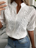 https://cdn.shopify.com/s/files/1/0822/8919/7383/files/Zomer-Bloemen-Borduren-Lace-Blouse-Vrouwen-Hollow-Out-Stand-Kraag-V-hals-Casual-Shirt-Elegante-Korte_b0aca3af-7a39-4e5d-9a1e-2358ebadd53b.jpg?v=1737537078
