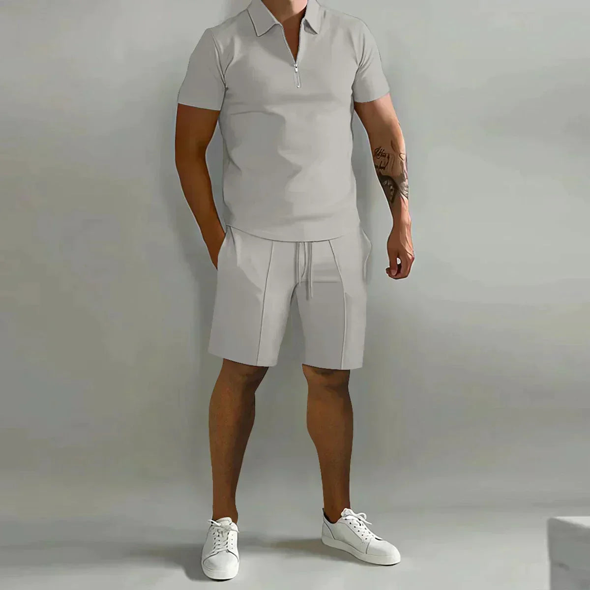 https://cdn.shopify.com/s/files/1/0799/5693/4996/files/mens-short-sleeve-zip-polo-shirt-and-drawstring-shorts-2-piece-set-04.webp?v=1778248903
