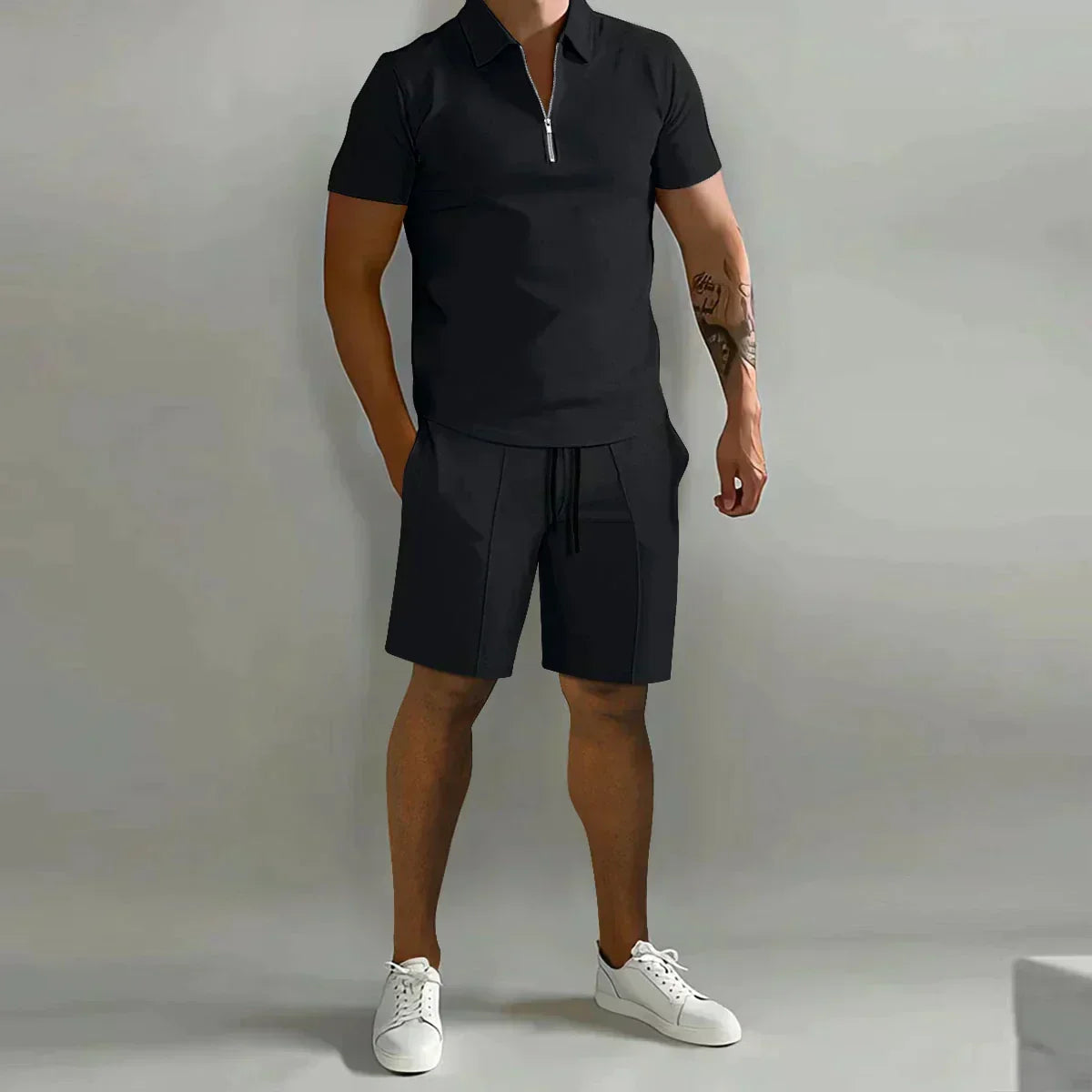 https://cdn.shopify.com/s/files/1/0799/5693/4996/files/mens-short-sleeve-zip-polo-shirt-and-drawstring-shorts-2-piece-set-06.webp?v=1778248903