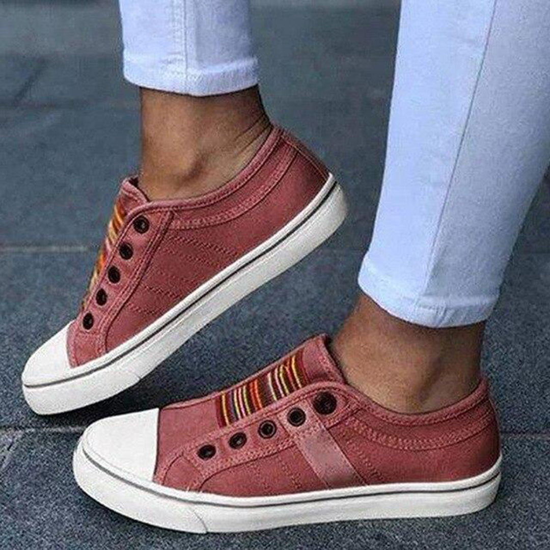 https://cdn.shopify.com/s/files/1/0868/7468/5776/files/thea-womens-slip-on-striped-sneakers-4.jpg?v=1779233720